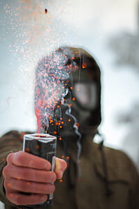 person holding gun digital wallpaper thumbnail