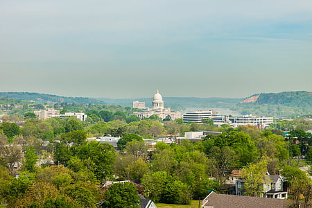 aerial photography of white concrete dome building near green trees thumbnail