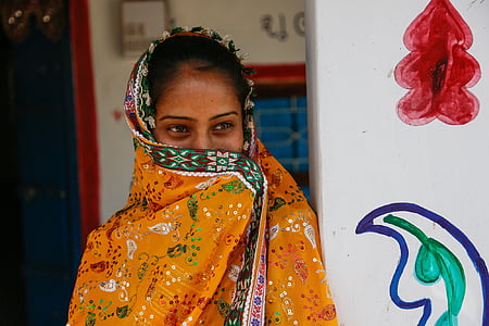 woman wearing multicolored traditional dress thumbnail