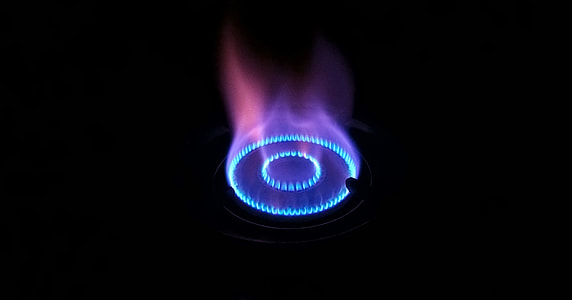 gas stove with blue and purple fire thumbnail