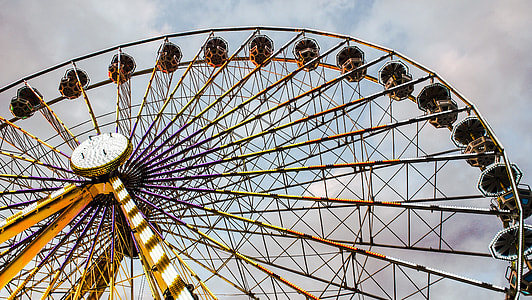 worm's eye view photography of yellow ferris wheel during day thumbnail