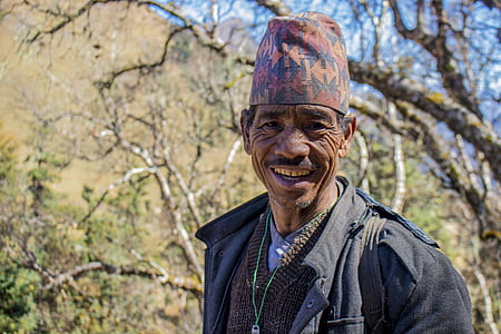 man wearing black jacket smiling thumbnail