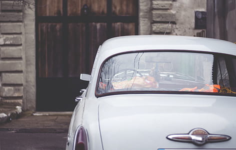 classic car parked near building thumbnail