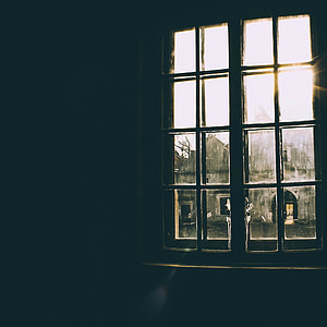 minimalist photography of glass window with sun ray thumbnail