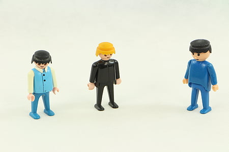 three plastic toys on white surface thumbnail