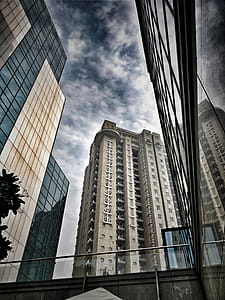 Low-angle Photo of Brown and Gray Concrete Building thumbnail