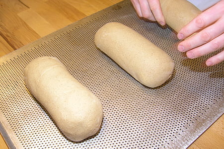 Person Making Brown Bread thumbnail