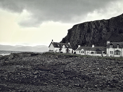 grayscale of house on seashore thumbnail