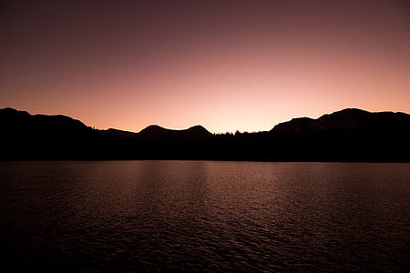 silhouette of mountains during sunset thumbnail