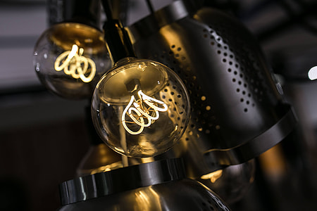 Bright lightbulbs giving warm light thumbnail
