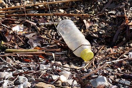 clear plastic bottle on ground thumbnail
