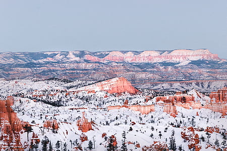 snowy mountain during day time thumbnail