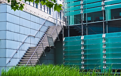 green and gray building at daytime thumbnail