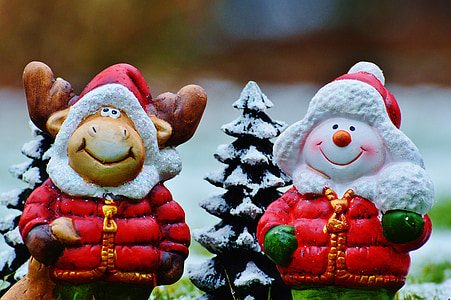 two snowman and reindeer with jacket figurines thumbnail