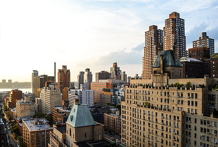 skyscrapers under cloudy sky thumbnail