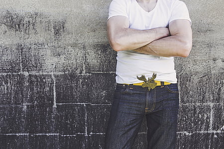 person leaning on wall during daytime thumbnail