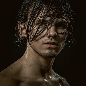 topless man with wet hair thumbnail
