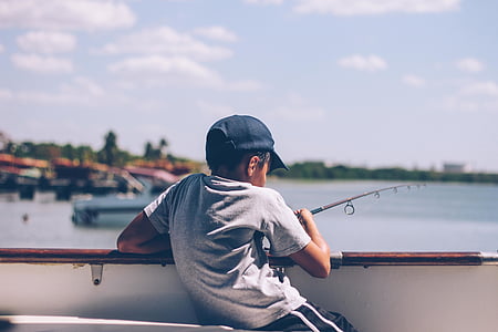 boy holding fishing rod thumbnail