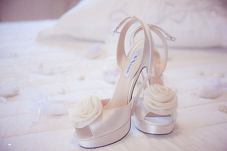 pair of white peep-toe slingback pumps thumbnail