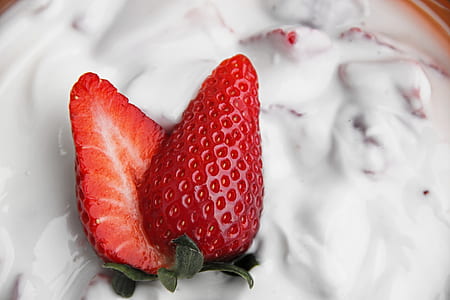 slice strawberry on top of cream thumbnail