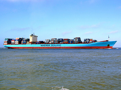 blue Maersk Sealand cargo ship sailing on body of water thumbnail