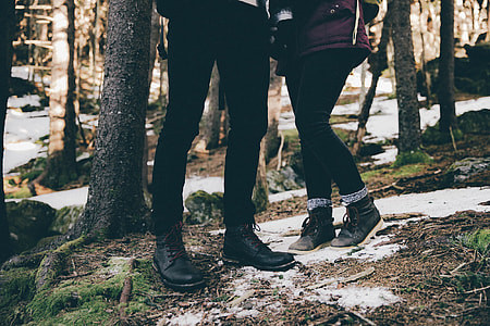 man and woman in black pants and sneakers thumbnail