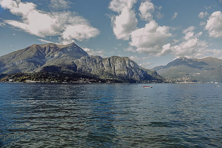 Body of Water Near Mountain thumbnail