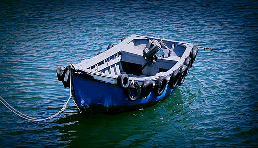 blue and white wooden boat thumbnail