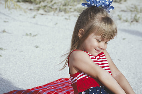 girl wearing white and red striped sleeveless top thumbnail