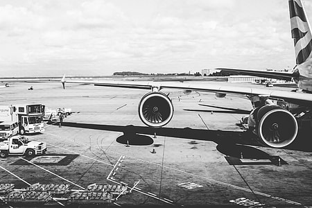 Airplane Wing with Jet Engines at the Airport thumbnail