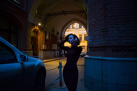woman in black long-sleeve bodycon dress thumbnail