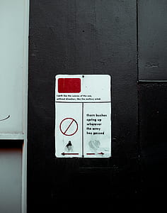white sticker on black wooden board thumbnail