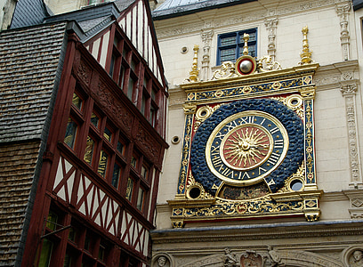 brown and blue clock on building thumbnail