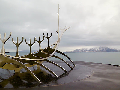 white wooden sley near body of water thumbnail