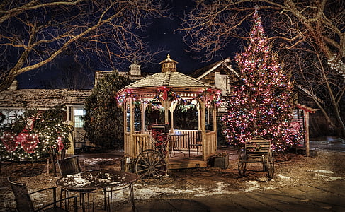 brown and gray wooden gazebo with string lights thumbnail