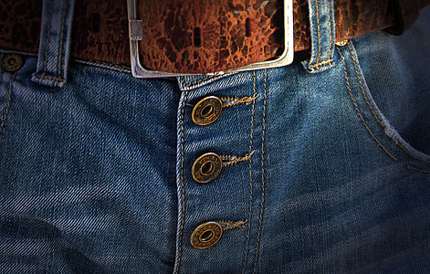 closeup photo of denim bottoms with brown belt thumbnail