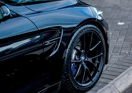 black BMW multi-spoke wheel and tire thumbnail