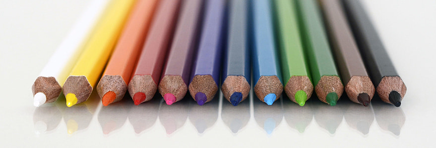 colored pencil lot on white surface thumbnail