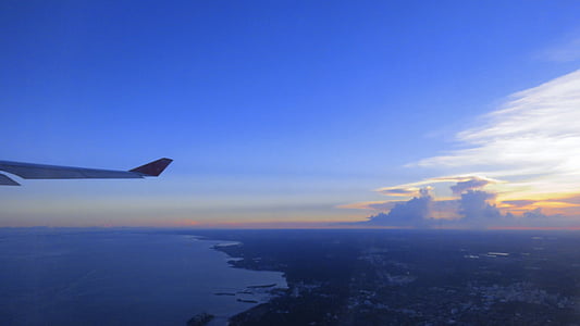 airplane flying during daytime thumbnail