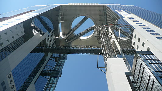 worms eye view photography of concrete structure thumbnail