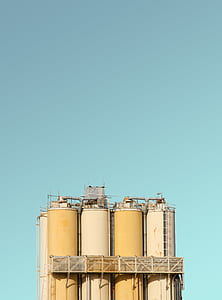 landscape photography of industrial tanks thumbnail