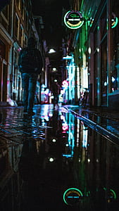 person walking on hallway during nightime thumbnail