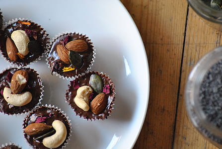 cashew and almond nuts on cupcake liners thumbnail
