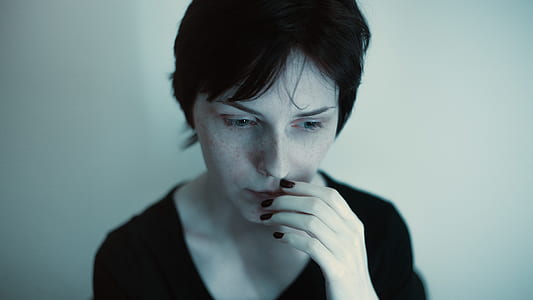 woman wearing black scoop-neck top thumbnail