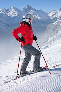 woman in jacket walking on snow thumbnail