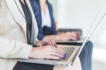 Womans Hands Working On Laptop Photo thumbnail