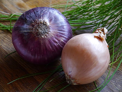 onion and garlic on brown surface thumbnail