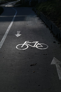 road with bicycle lane on focus photo thumbnail
