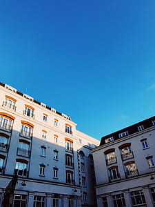 white and black concrete building at daytime thumbnail