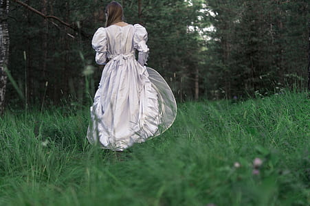 woman wearing white long-sleeved gown thumbnail